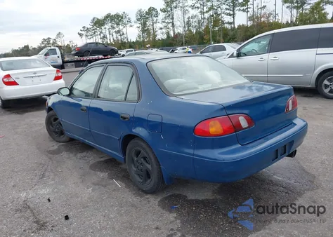 1999 Toyota Corolla Le z USA, uszkodzony, nr VIN 2T1BR12E9XC232710